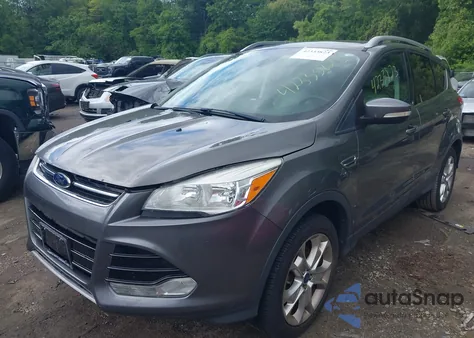 2014 Ford Escape Titanium z USA, uszkodzony, nr VIN 1FMCU9J99EUA88593